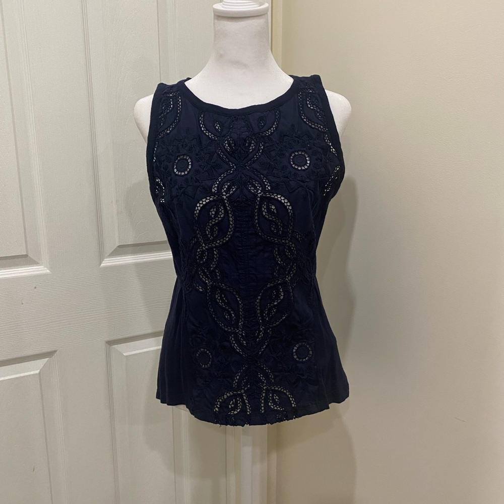 Embroidered lace top.